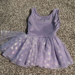 Light purple leotard for dance with attached tutu